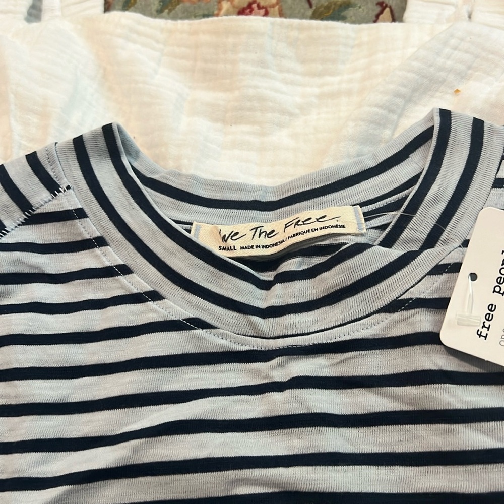 We the free top size small